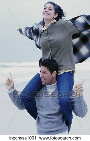 men, women, smile, freedom, clothing, jeans, carefree View Large Photo Image Stock Image - men, women, smile, freedom, clothing, jeans, carefree. Fotosearch