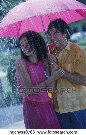 men, women, smile, holding hands, love, clothing, wet View Large Photo Image Stock Photograph - men, women, smile, holding hands, love, clothing, wet. Fotosearch