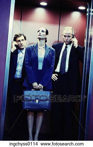 men, women, stand, hip, clothing, businessmen, inside View Large Photo Image Picture - men, women, stand, hip, clothing, businessmen, inside. Fotosearch