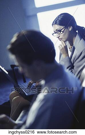 men, women, waiting, lounge, looking down, clothing, businessmen View Large Photo Image Stock Photograph - men, women, waiting, lounge, looking down, clothing, businessmen. Fotosearch