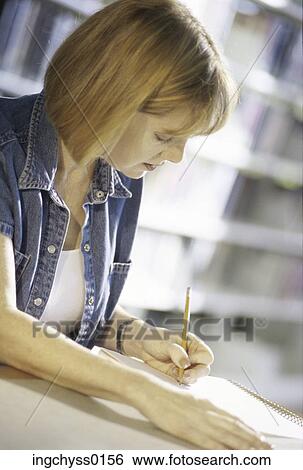 one, woman, years, write, sit, Young Adult, libraries View Large Photo Image Stock Photograph - one, woman, years, write, sit, Young Adult, libraries. Fotosearch