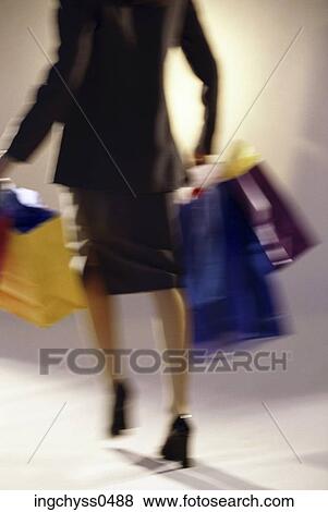 Stock Photo - paper, woman, heels, carry, section, Low, high heels. Fotosearch