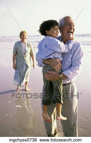 people, beach, family, grandchild, grandparent, grandkid View Large Photo Image Stock Photo - people, beach, family, grandchild, grandparent, grandkid. Fotosearch