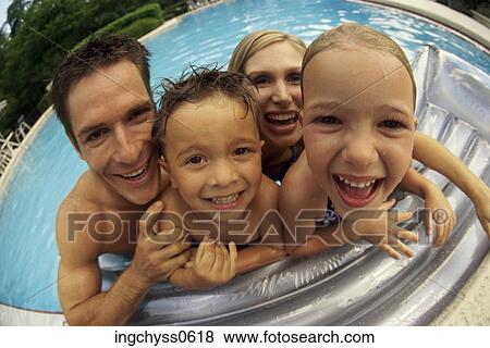 Stock Photo - people, beach, family, parents. Fotosearch