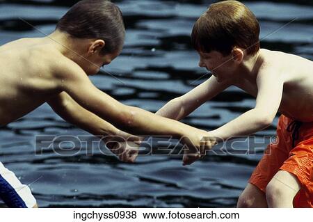 people, Brown, children, holding hands, play, boys, fun View Large Photo Image Stock Photo - people, Brown, children, holding hands, play, boys, fun. Fotosearch