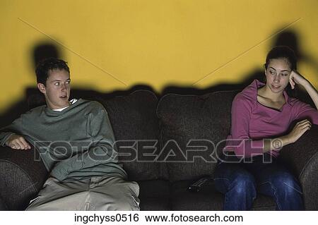 Stock Photograph - people, Brown, TV, indoors, cloth, domestic, teenager. Fotosearch