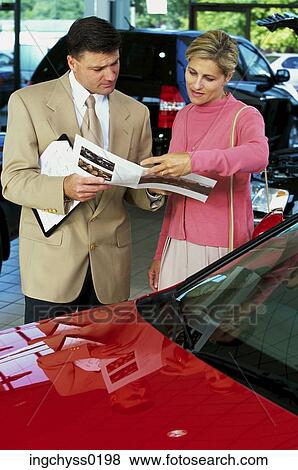 people, couple, car, reading, cars, shopping, salesman View Large Photo Image Stock Photo - people, couple, car, reading, cars, shopping, salesman. Fotosearch