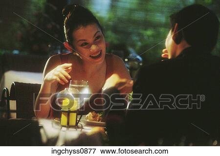 Stock Photo - people, couple, drinking, dining, Young Adult. Fotosearch