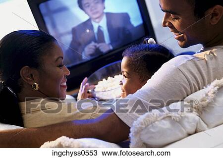 Stock Image - people, family, parents, indoors. Fotosearch