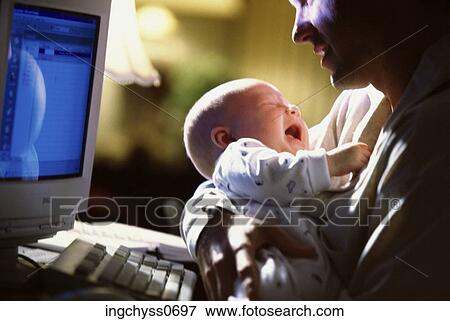 people, home, baby, computer, crying, holding View Large Photo Image Stock Photo - people, home, baby, computer, crying, holding. Fotosearch