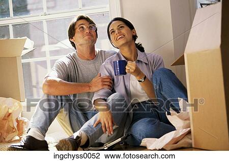 people, home, unpack, Young Adult, moving in, furnish, furnishing View Large Photo Image Stock Image - people, home, unpack, Young Adult, moving in, furnish, furnishing. Fotosearch