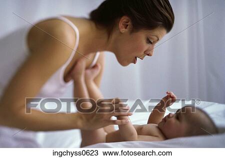 people, mother, baby, family, parent, indoors View Large Photo Image Stock Image - people, mother, baby, family, parent, indoors. Fotosearch