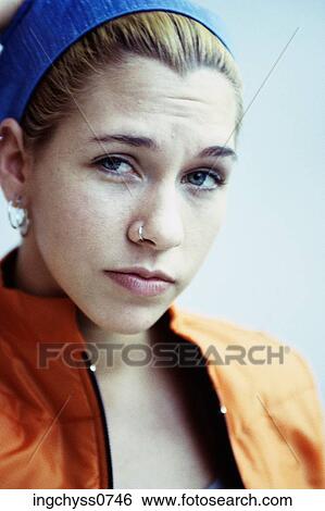 people, staring, nose, serious, ring, piercing, earrings View Large Photo Image Stock Photograph - people, staring, nose, serious, ring, piercing, earrings. Fotosearch