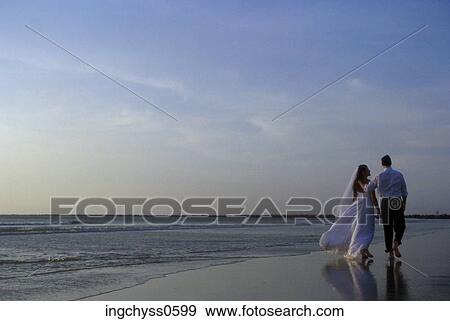 people, walking, couple, beach, romantic, wedding, romance View Large Photo Image Stock Photo - people, walking, couple, beach, romantic, wedding, romance. Fotosearch