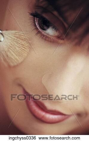Stock Photograph - people, woman, face, brushing, makeup, brush, detail. Fotosearch