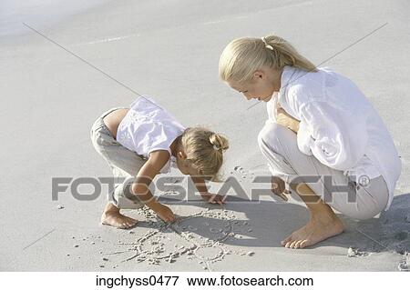 sand, women, play, love, ponytail, full, fun View Large Photo Image Stock Photo - sand, women, play, love, ponytail, full, fun. Fotosearch