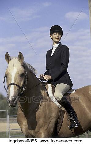Stock Photography - sky, fence, uniform, mounted, saddle, ride, animal. Fotosearch