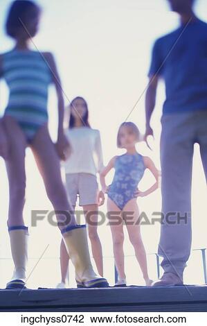 sky, men, girls, daughter, clothing, leisure, happiness View Large Photo Image Stock Image - sky, men, girls, daughter, clothing, leisure, happiness. Fotosearch