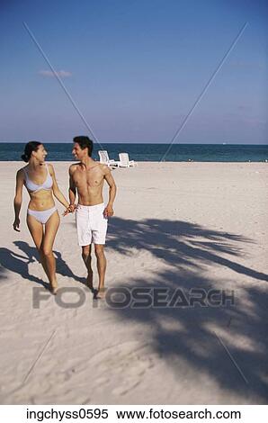 sky, men, view, looking, barefoot, holding hands View Large Photo Image Stock Photography - sky, men, view, looking, barefoot, holding hands. Fotosearch