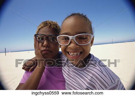 sky, sand, blond, girls, daughter, clothing, portrait View Large Photo Image Stock Photo - sky, sand, blond, girls, daughter, clothing, portrait. Fotosearch