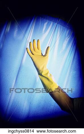 spotlight, yellow, arm, shot, cleaning, glove, up View Large Photo Image Picture - spotlight, yellow, arm, shot, cleaning, glove, up. Fotosearch