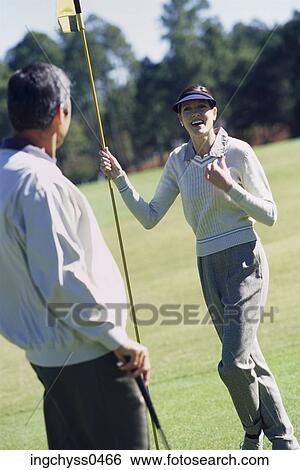 tree, grass, jacket, foreground, tilt, smile, stand View Large Photo Image Stock Photograph - tree, grass, jacket, foreground, tilt, smile, stand. Fotosearch