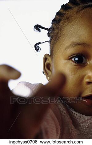 Stock Photograph - white, face, dreadlocks, months, close up, Looking at Camera. Fotosearch