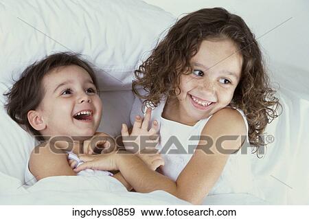 white, people, togetherness, short hair, shoulders, living room, indoors View Large Photo Image Stock Photo - white, people, togetherness, short hair, shoulders, living room, indoors. Fotosearch