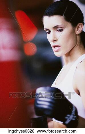 woman, black, Caucasian, look, years, boxing glove, tank top View Large Photo Image Stock Photo - woman, black, Caucasian, look, years, boxing glove, tank top. Fotosearch
