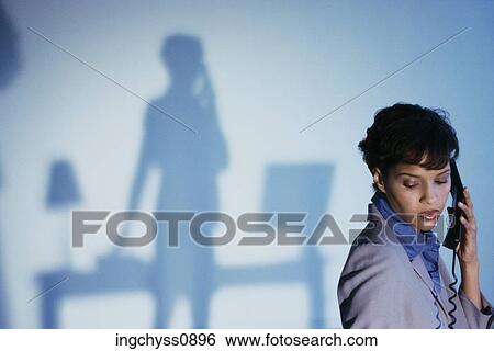 woman, black, clothing, cord, connection, short hair, communication View Large Photo Image Stock Photograph - woman, black, clothing, cord, connection, short hair, communication. Fotosearch
