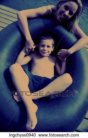 women, people, family, child, barefoot, holding hands View Large Photo Image Stock Image - women, people, family, child, barefoot, holding hands. Fotosearch