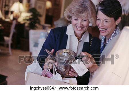 women, people, shopping bag, leisure, happiness, casual, togetherness View Large Photo Image Stock Photo - women, people, shopping bag, leisure, happiness, casual, togetherness. Fotosearch