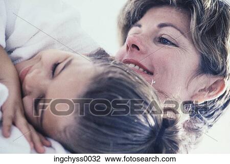 women, people, togetherness, shoulders, parent, indoors, care View Large Photo Image Stock Image - women, people, togetherness, shoulders, parent, indoors, care. Fotosearch