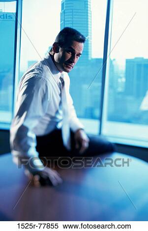 blur, business, Middle-aged, businessman, indoors View Large Photo Image Stock Photography - blur, business, Middle-aged, businessman, indoors. Fotosearch