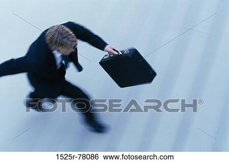 Stock Photograph - blur, steps, stairs, briefcase, motion. Fotosearch