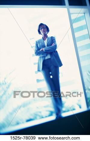 blur, woman, window, confident, standing, business, Middle-aged View Large Photo Image Stock Photo - blur, woman, window, confident, standing, business, Middle-aged. Fotosearch