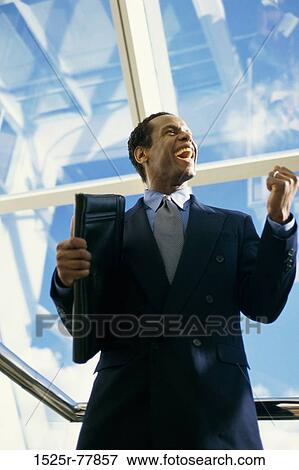 business, Middle-aged, joyous, businessman, indoors View Large Photo Image Stock Photo - business, Middle-aged, joyous, businessman, indoors. Fotosearch