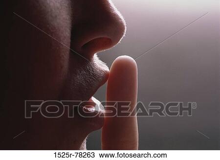 Stock Image - finger, mouth, silence, body parts, quiet, close-up. Fotosearch