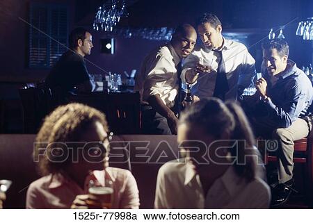 group, multiethnic, talking, drinking, pointing, bar View Large Photo Image Stock Image - group, multiethnic, talking, drinking, pointing, bar. Fotosearch