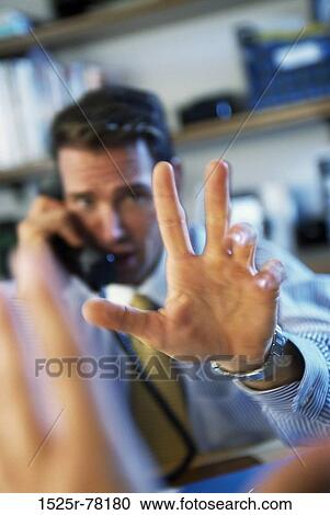 hand, desk, telephone, talking, phone, gesturing View Large Photo Image Stock Image - hand, desk, telephone, talking, phone, gesturing. Fotosearch