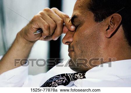 Stock Image - headache, stress, business, defeat, Middle-aged. Fotosearch