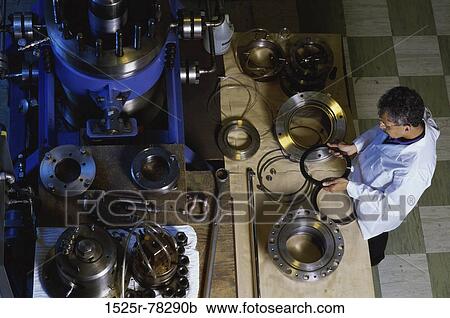 Inspecting Seal Rings Mechanical Equipment Development Lab Chalk River Nuclear Lab Ontario, Canada View Large Photo Image Stock Image - Inspecting Seal Rings Mechanical Equipment Development Lab Chalk River Nuclear Lab Ontario, Canada. Fotosearch