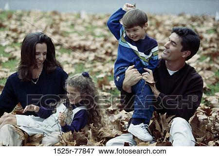 leaves, people, smiling, autumn, playing, laughing View Large Photo Image Stock Photo - leaves, people, smiling, autumn, playing, laughing. Fotosearch