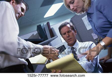 meeting, group, coworkers, notepad, pointing, business View Large Photo Image Stock Photo - meeting, group, coworkers, notepad, pointing, business. Fotosearch