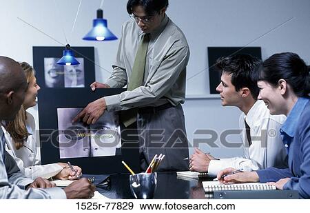 meeting, group, multiethnic, attentive, talking, presentation View Large Photo Image Stock Photo - meeting, group, multiethnic, attentive, talking, presentation. Fotosearch