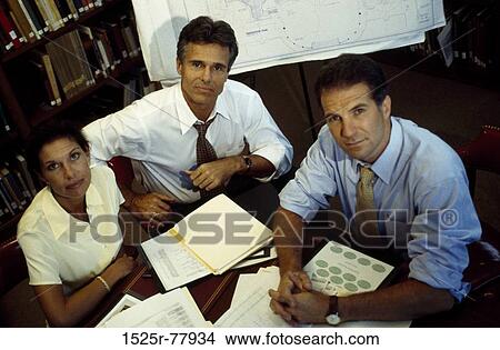 Picture - meeting, group, multiethnic, people, staring, business. Fotosearch