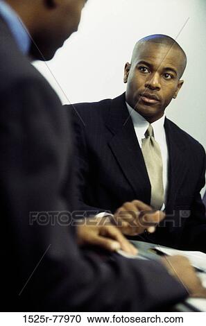 meeting, men, listening, sitting, business, serious, businessmen View Large Photo Image Stock Image - meeting, men, listening, sitting, business, serious, businessmen. Fotosearch