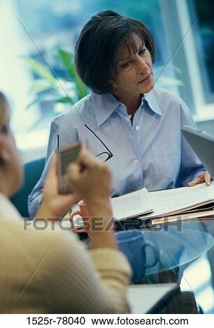 meeting, women, talking, discussion, reading, business, Middle-aged View Large Photo Image Stock Image - meeting, women, talking, discussion, reading, business, Middle-aged. Fotosearch