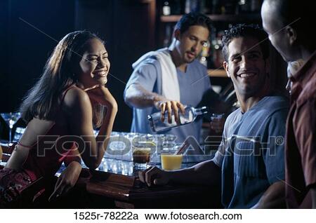 multiethnic, pouring, drinking, flirting, bar, alcoholic View Large Photo Image Stock Image - multiethnic, pouring, drinking, flirting, bar, alcoholic. Fotosearch