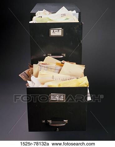 Stock Image - paperwork, papers, business, messy, full, still life. Fotosearch